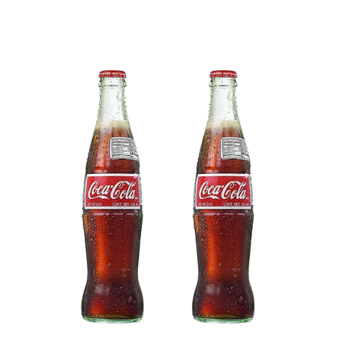 Two glass bottles of Mexican Coke